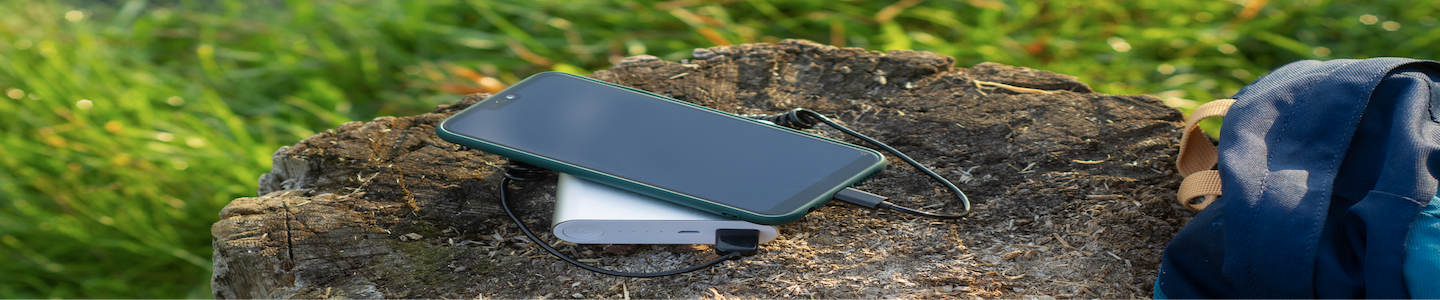 Portable Power bank on top of rock